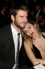 MILEY CYRUS and Liam Hemsworth at G