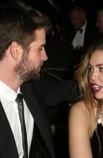 MILEY CYRUS and Liam Hemsworth at G