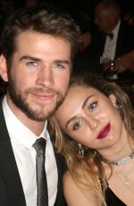 MILEY CYRUS and Liam Hemsworth at G