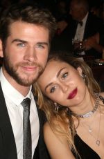 MILEY CYRUS and Liam Hemsworth at G