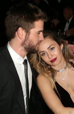 MILEY CYRUS and Liam Hemsworth at G