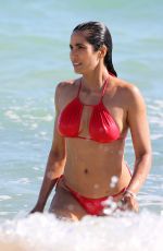 PADMA LAKSHMI in Red Bikini at a Beach in Miami 01/07/2019