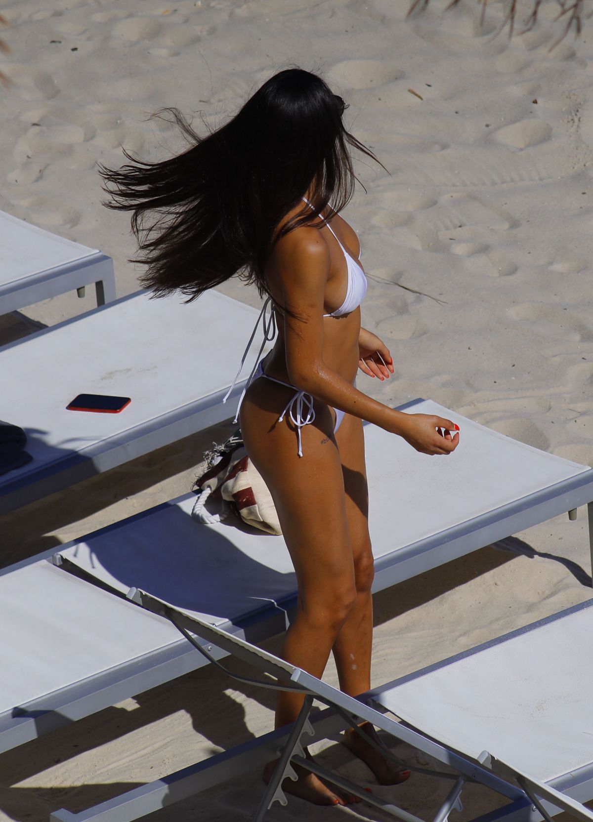 REBECCA SCOTT in Bikini on the Beach in Miami 01/02/2019.