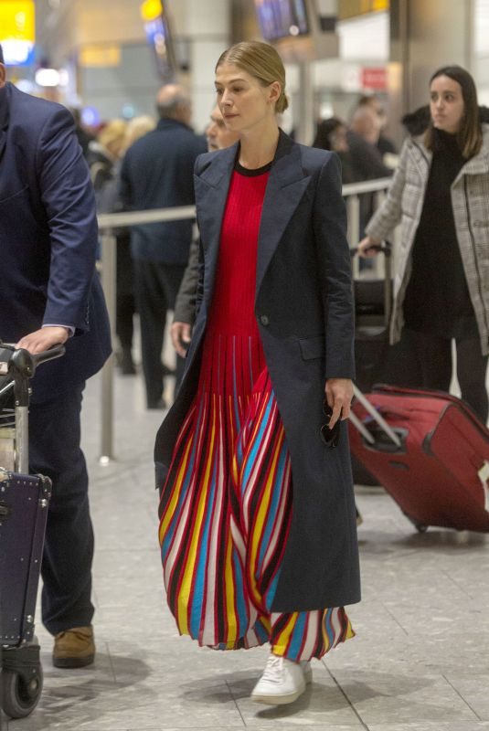 ROSAMUND PIKE at Heathrow Airport in London 01/08/2019