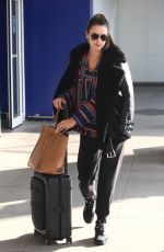 ALESSANDRA AMBROSIO Arrives at Linate Airport in Milan 02/18/2019