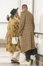 ASHLEE SIMPSON and Evan Ross at LAX Airport in Los Angeles 01/31/2019