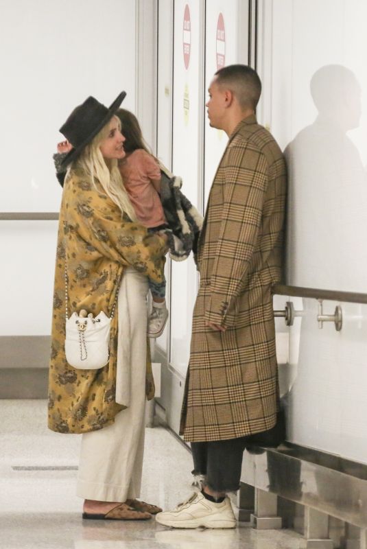 ASHLEE SIMPSON and Evan Ross at LAX Airport in Los Angeles 01/31/2019