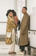 ASHLEE SIMPSON and Evan Ross at LAX Airport in Los Angeles 01/31/2019