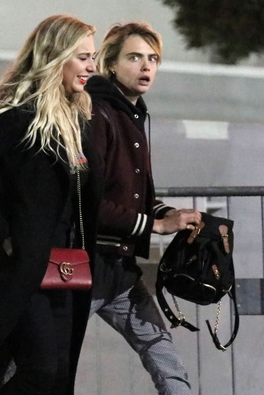 CARA DELEVINGNE and ASHLEY BENSON at Elton John’s Concert in Inglewood 02/02/2019