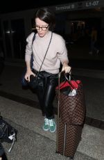 CLAIRE FOY at LAX Airport in Los Angeles 02/04/2019