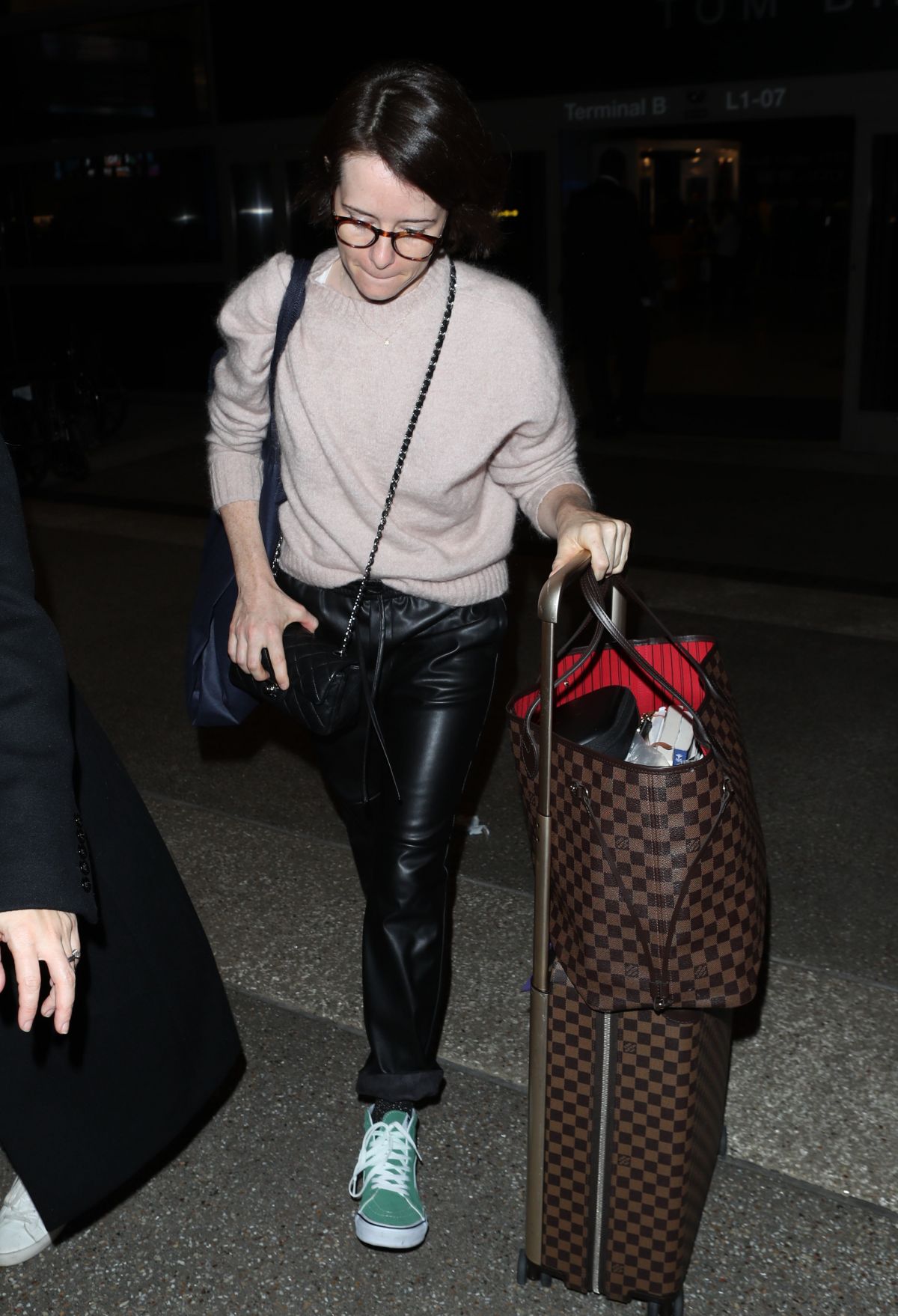 CLAIRE FOY at LAX Airport in Los Angeles 02/04/2019 – HawtCelebs