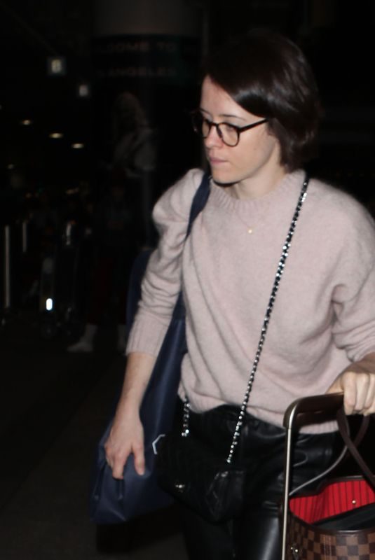 CLAIRE FOY at LAX Airport in Los Angeles 02/04/2019