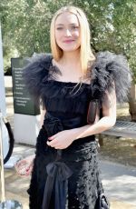 DAKOTA FANNING at Rodarte Fashion Show in San Marino 02/05/2019