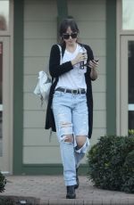 DAKOTA JOHNSON in Ripped Jeans Out in Los Angeles 02/11/2019