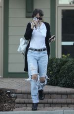 DAKOTA JOHNSON in Ripped Jeans Out in Los Angeles 02/11/2019