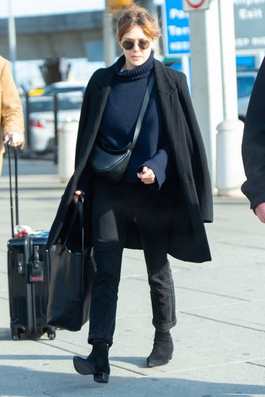 ELIZABETH OLSEN Arrivesa at JFK Airport in New York 02/15/2019