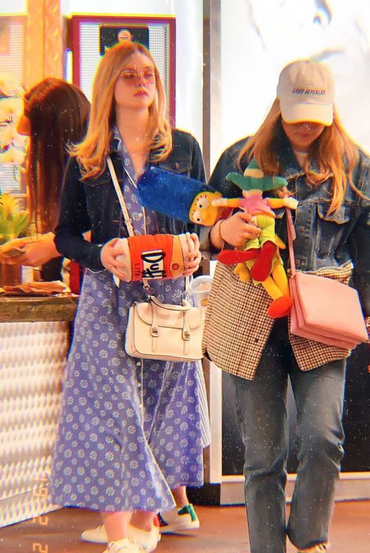 ELLE and DAKOTA FANNING Out at Universal Studios in Los Angeles 02/23/2019