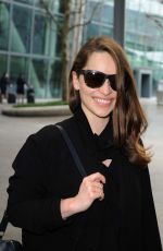 EMILIA CLARKE at Heathrow Airport in London 02/07/2015