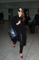 EMILIA CLARKE at Heathrow Airport in London 02/07/2015