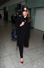 EMILIA CLARKE at Heathrow Airport in London 02/07/2015