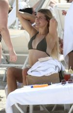 EUGENIE BOUCHARD in Bikini on the Beach in Miami 02/22/2019