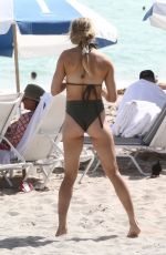 EUGENIE BOUCHARD in Bikini on the Beach in Miami 02/22/2019