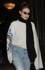 GIGI HADID in Ripped Denim Out in London 02/16/2019
