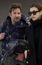 IRINA SHAYK and Bradley Cooper at JFK Airport in New York 02/07/2019