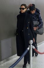 IRINA SHAYK and Bradley Cooper at JFK Airport in New York 02/07/2019