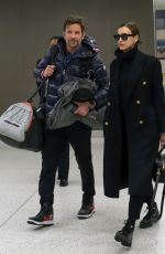 IRINA SHAYK and Bradley Cooper at JFK Airport in New York 02/07/2019