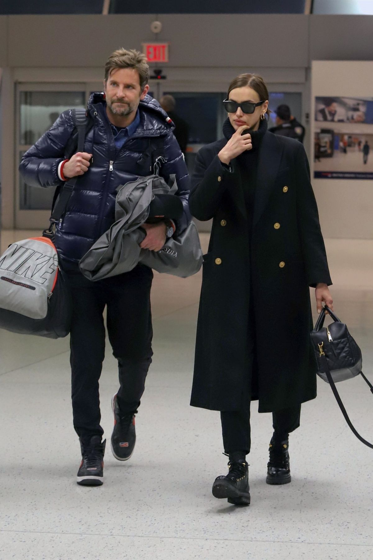 IRINA SHAYK and Bradley Cooper at JFK Airport in New York 02/07/2019 ...