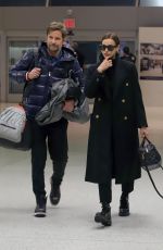 IRINA SHAYK and Bradley Cooper at JFK Airport in New York 02/07/2019