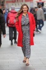 KELLY BROOK in a Red Coat Out in London 02/20/2019
