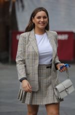 KELLY BROOK in Plaid Skirt Arrives at Global Radio in London 02/18/2019