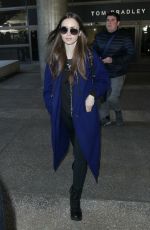 LILY COLLINS at Los Angeles International Airport 02/11/2019