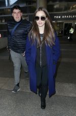LILY COLLINS at Los Angeles International Airport 02/11/2019