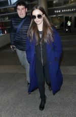 LILY COLLINS at Los Angeles International Airport 02/11/2019