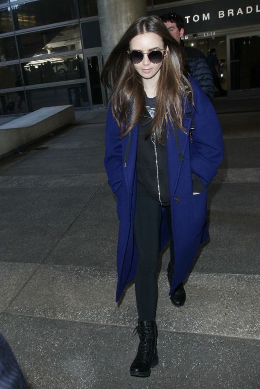 LILY COLLINS at Los Angeles International Airport 02/11/2019