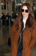 LILY COLLINS at Los Angeles International Airport 02/27/2019