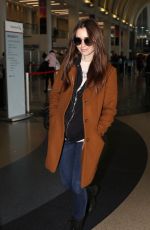 LILY COLLINS at Los Angeles International Airport 02/27/2019