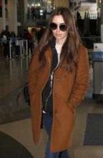 LILY COLLINS at Los Angeles International Airport 02/27/2019