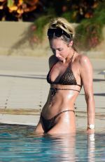 MEGAN MCKENNA in Bikini at a Pool in Tenerife 02/11/2019