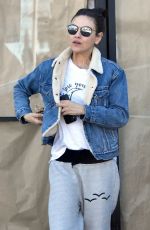 MILA KUNIS at Alfred