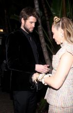 MILEY CYRUS and Liam Hemsworth at Charles Finch and Chanel