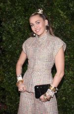 MILEY CYRUS and Liam Hemsworth at Charles Finch and Chanel