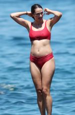 Pregnant LAURA BYRNE in Red Bikini at Bondi Beach in Sydney 02/04/2019