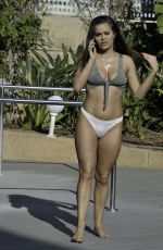 RHAINNE SAXBY in Bikini at a Pool in Spain 02/19/2019