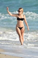 TANY BURR in a Black Bikini at a Beach in Miami 02/02/2019