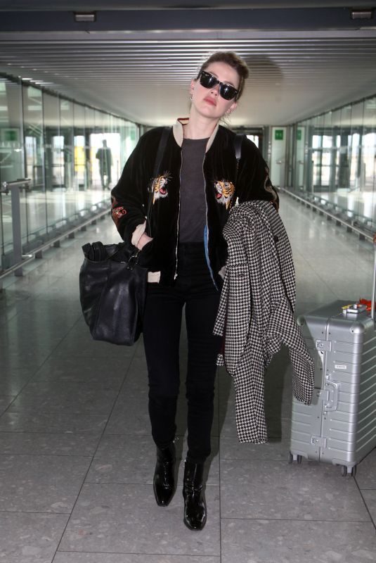 AMBER HEARD at Heathrow Airport in London 03/08/2019