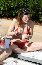 BELLA and DANI THORNE in Bikinis at a Pool in Miami 03/13/2019